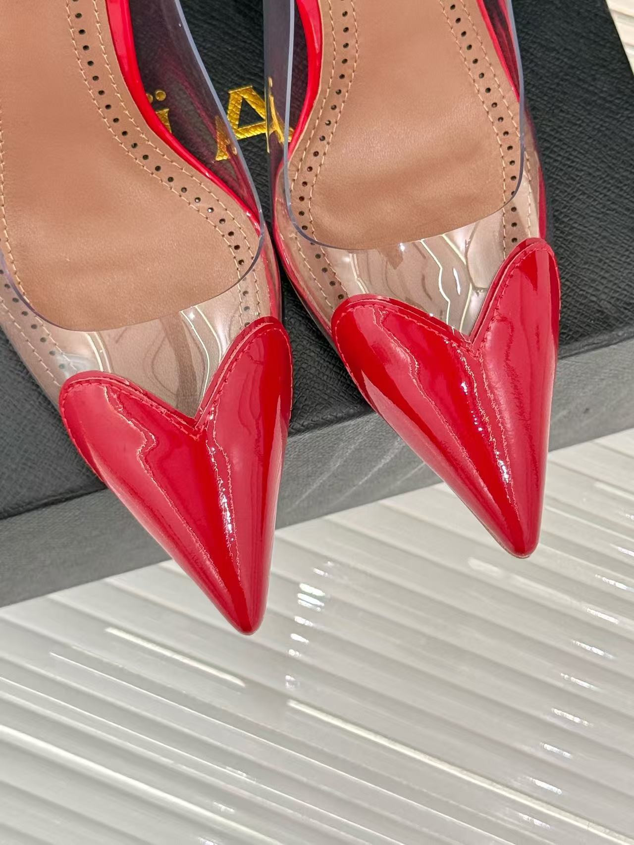 UA ALAÏA Patent Heart-Toe Stiletto Pumps
