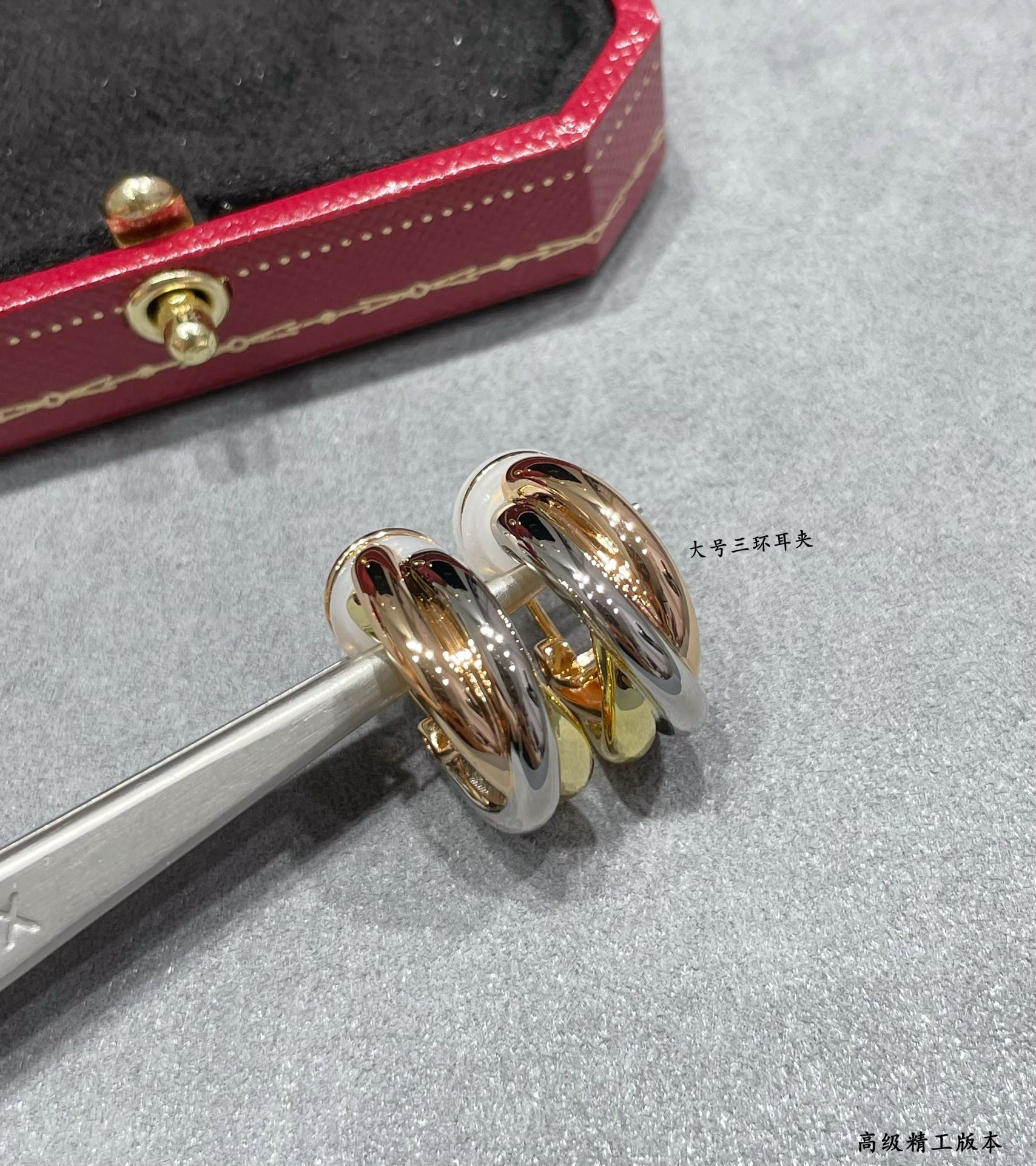 Ca*t*er large three-hand earrings