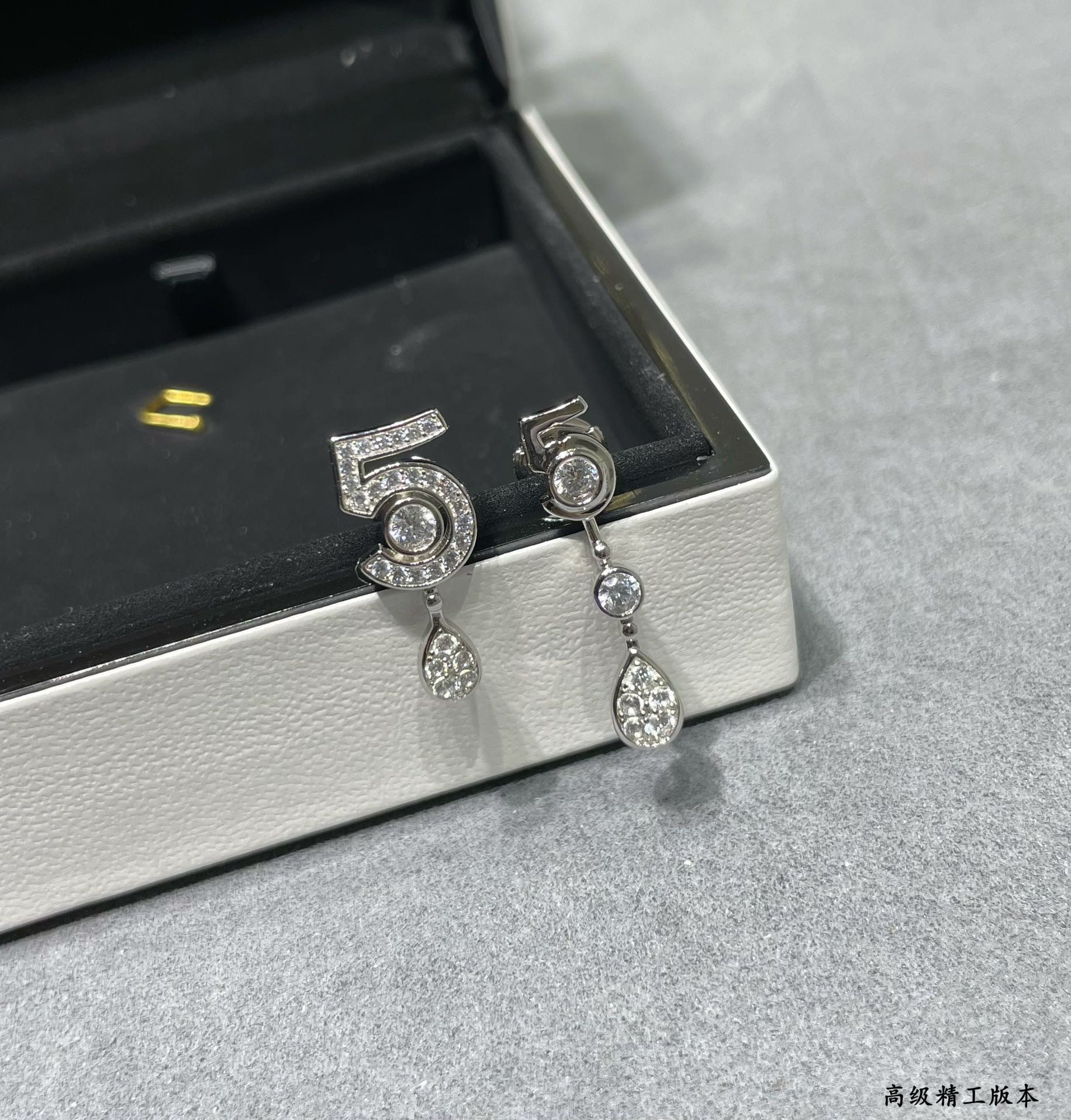 Ch*el 5-word earrings