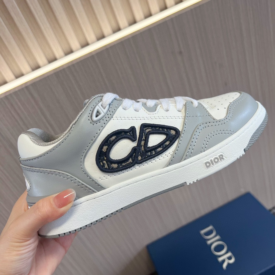 ua D*or b57 low-top sneaker gray and white